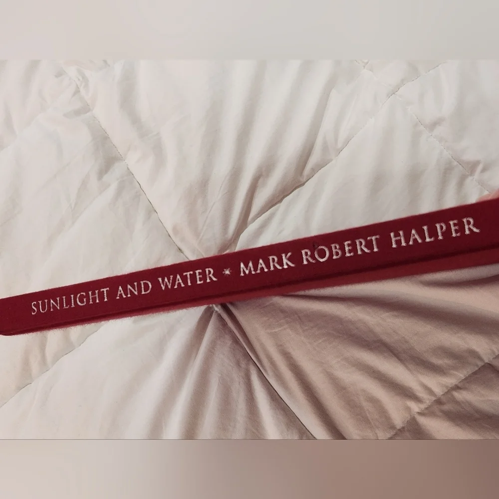 Sunlight and Water Book - Red Cover